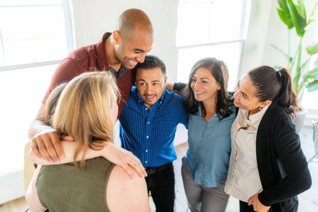Group of people supporting each other.